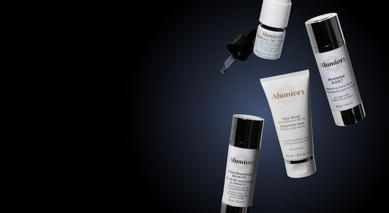 AlumierMD Core 4 Essentials product photo on dark gradient background skincare routine to fight Oxidative Aging
